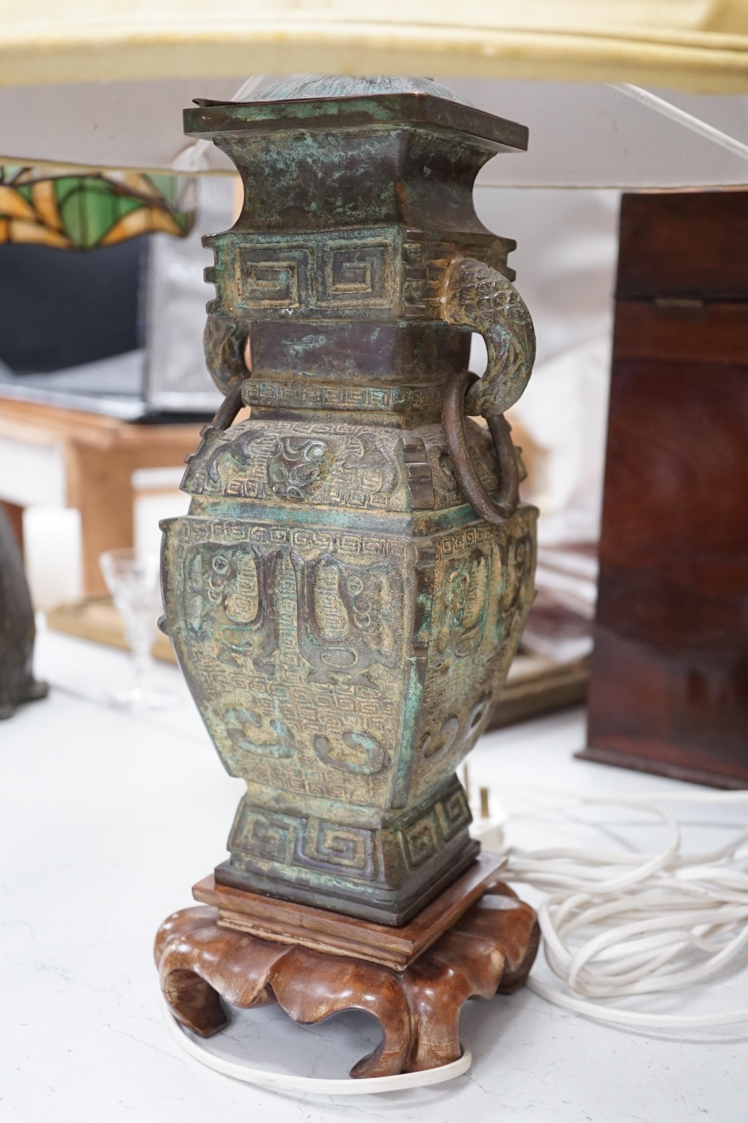 A pair of 20th century Chinese archaistic design bronze table lamps height to top of vase 37 cm